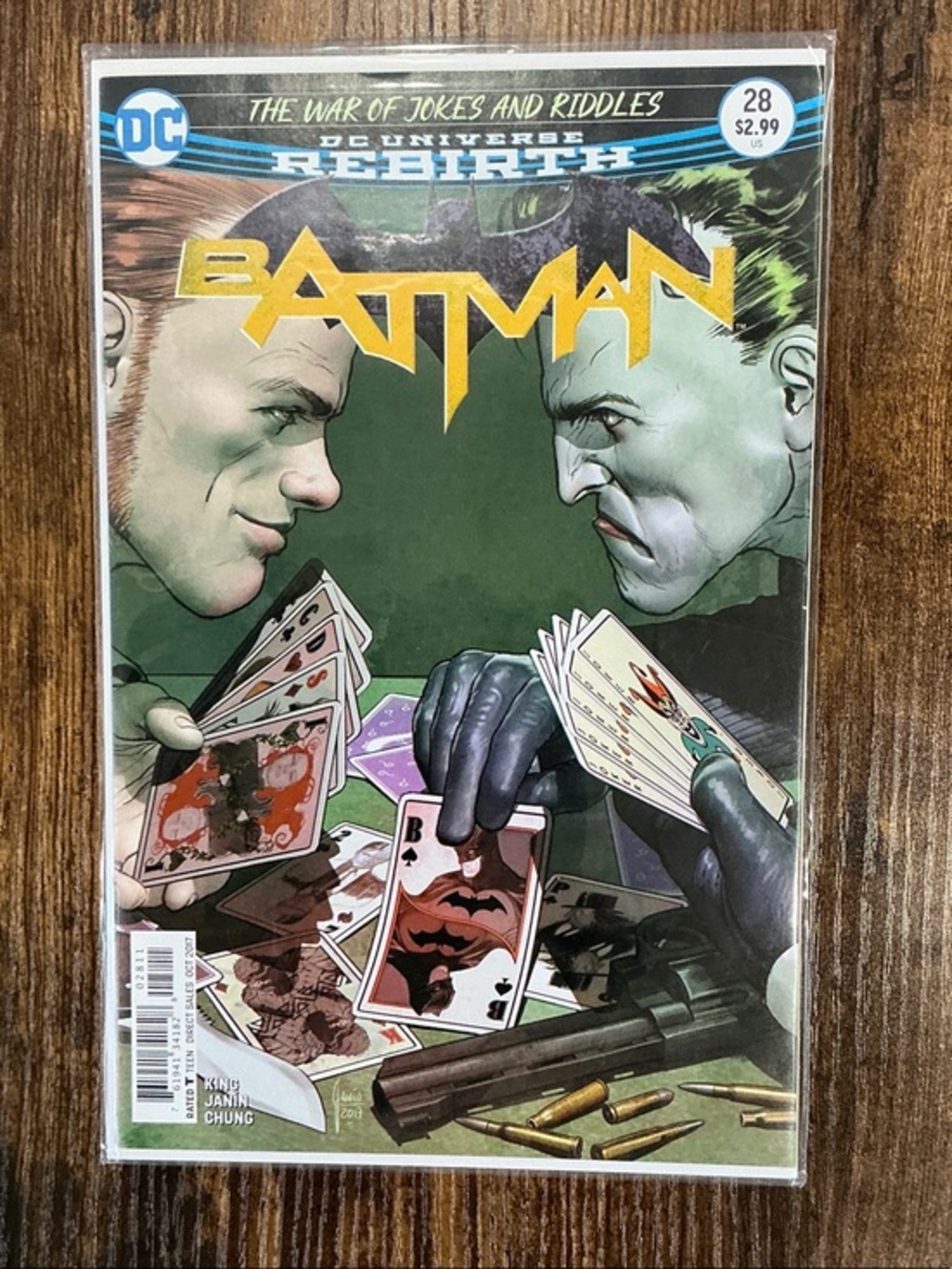 DC Batman #28 Comic Cover — Yellow Logo on Green Background